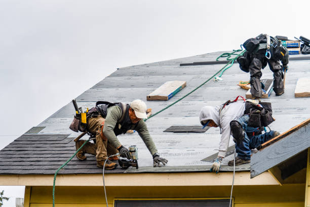 Professional Roofing technician working in Greenfield Park, NY